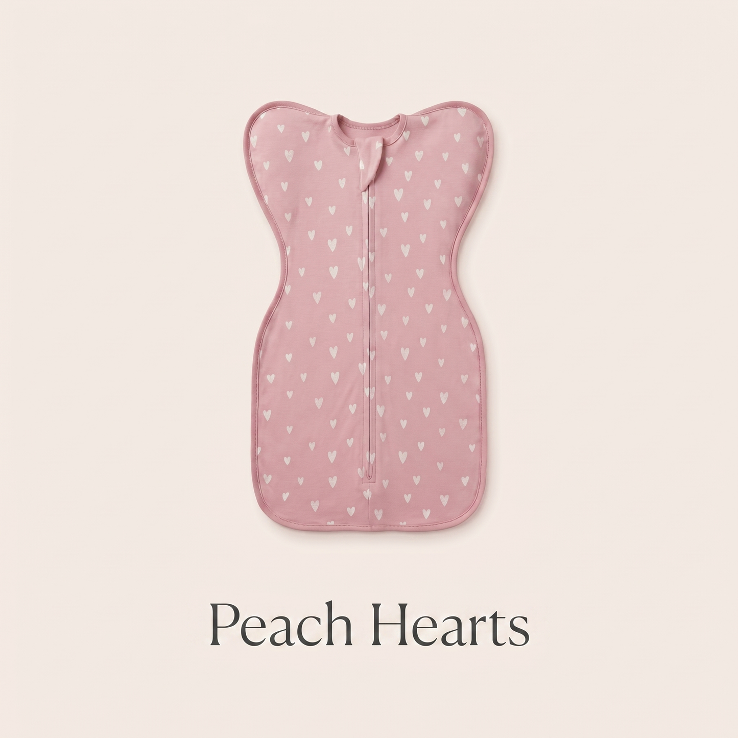 Peach Hearts DreamWrap swaddle with name label