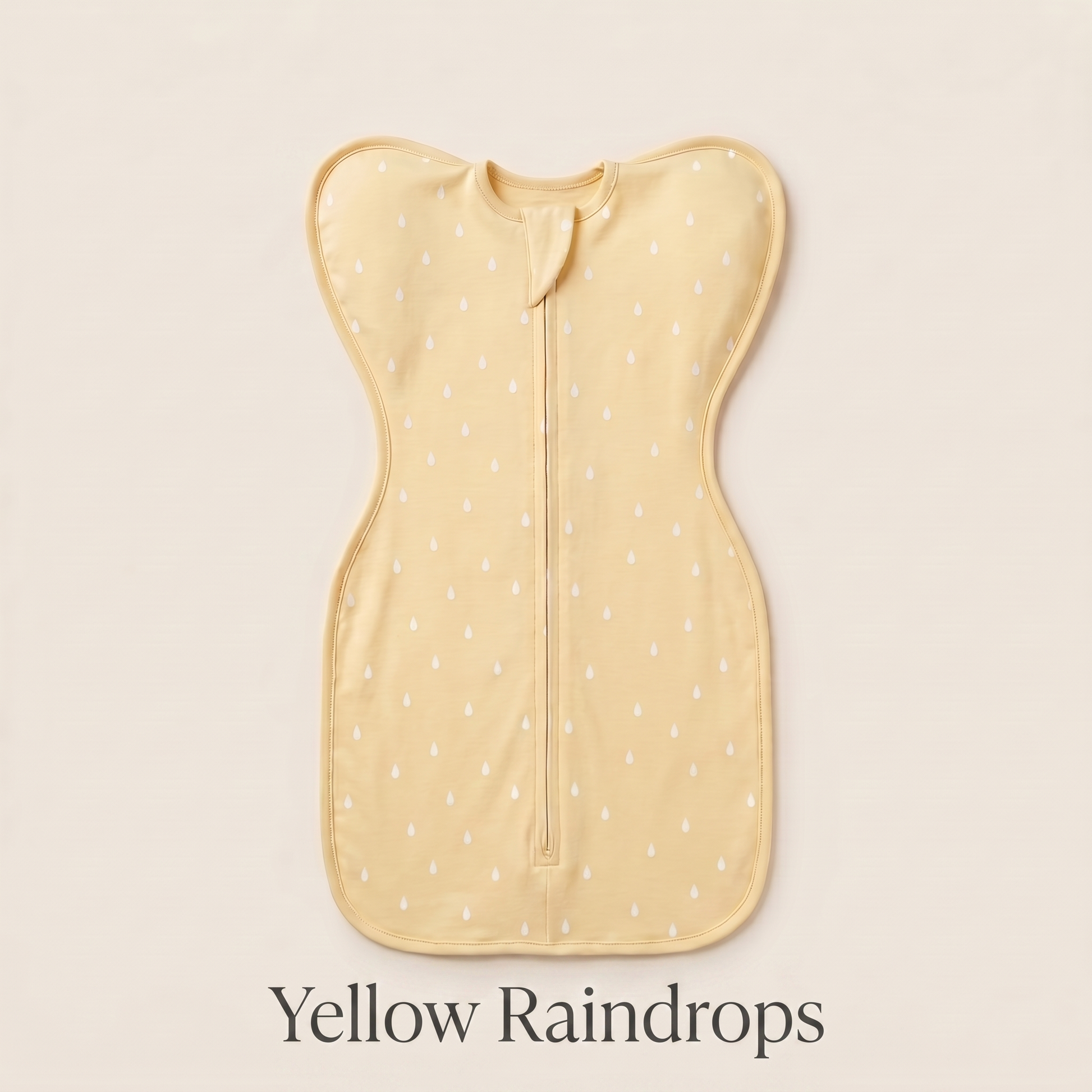 Yellow Raindrops DreamWrap swaddle with name label