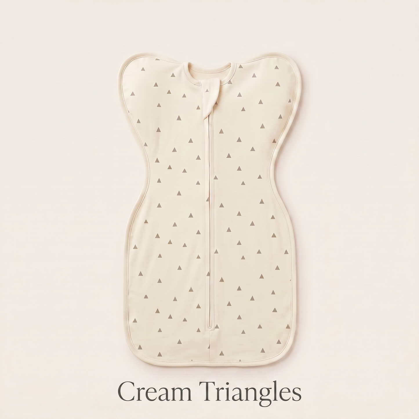 Cream Triangles DreamWrap swaddle with name label