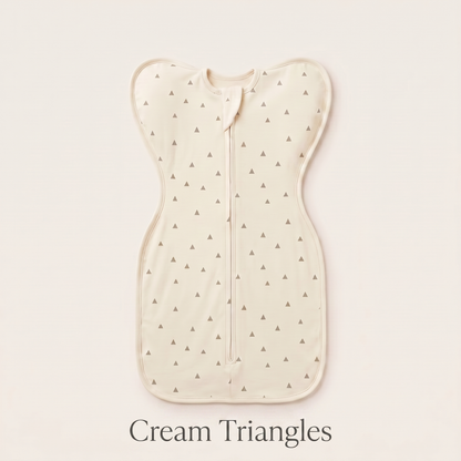 Cream Triangles DreamWrap swaddle with name label