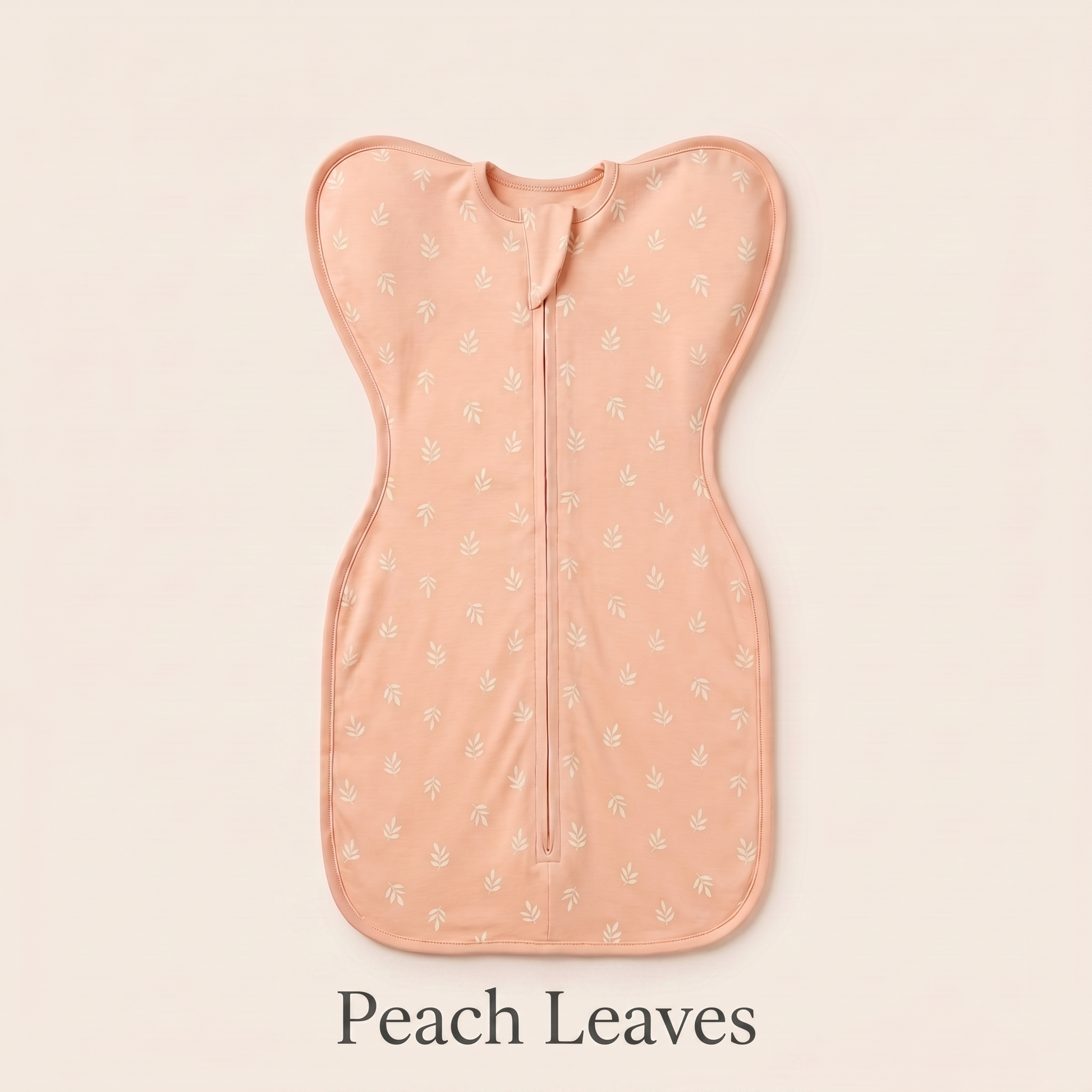 Peach Leaves DreamWrap swaddle with name label