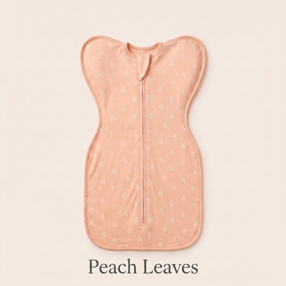 Peach Leaves DreamWrap swaddle with name label