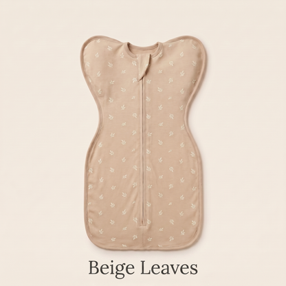 Beige Leaves DreamWrap swaddle with name label
